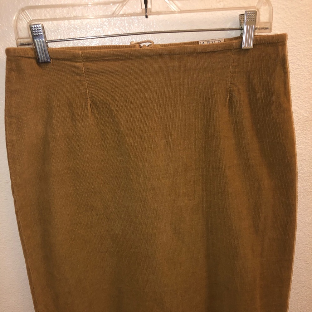 Mid length skirt, tan, one slit on the side